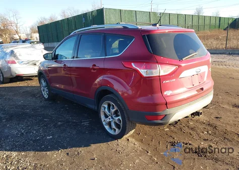 2014 Ford Escape Titanium z USA, uszkodzony, nr VIN 1FMCU9J9XEUA73116